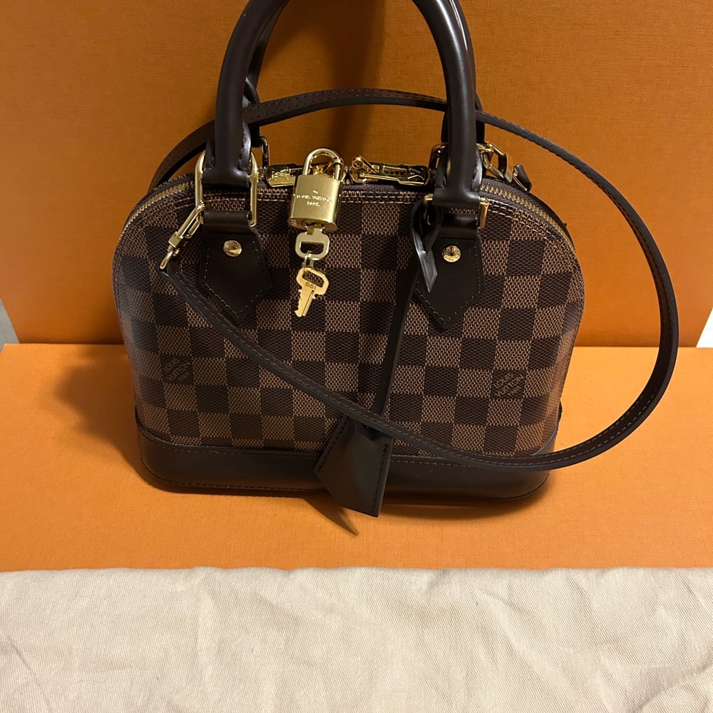 Like new Louis Vuitton Alma BB Damier Ebene